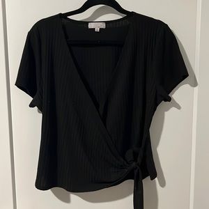 Black, low cut, side tie top. Size XL
